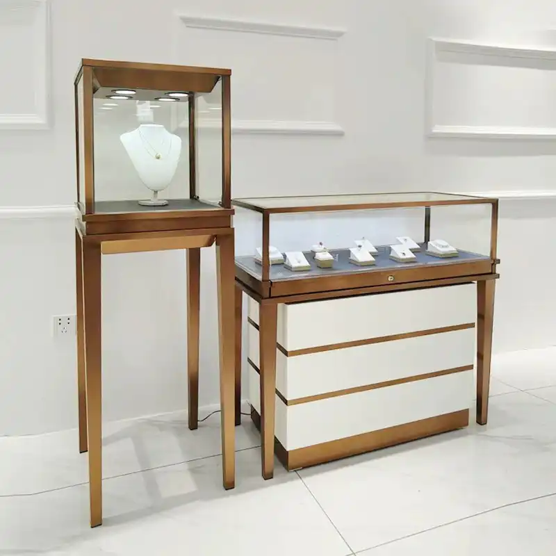 Hb4d3ecc87225463aac65641c4eb58b11U.jpg High-End Gold Jewelry Display Cabinet Custom Stainless Steel Counter Shelves for Glasses Watches Elegant Glass Showcases - Image 1
