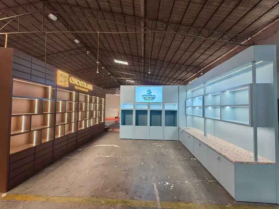 Empty retail space with display shelves